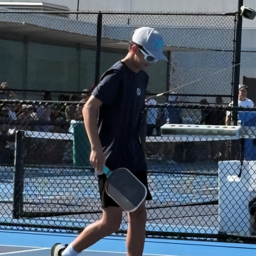 Junior pickleball player Aiden Schliekelman competing with TriggerGrip Pro for better paddle control, power, and elbow and wrist relief