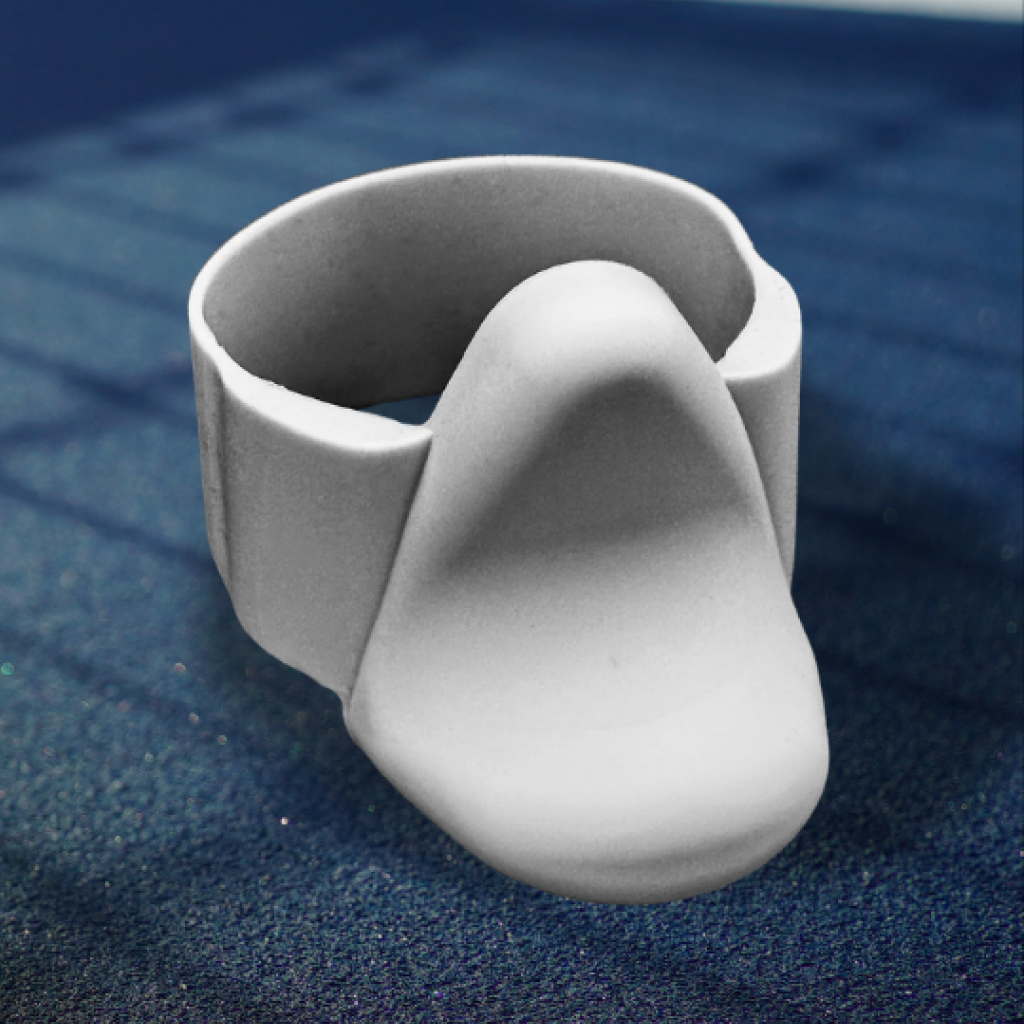 Stealth Grey TriggerGrip Pro pickleball paddle grip insert close-up on court surface